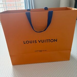 Louis Vuitton Vibrant Orange Bag with Blue Handles